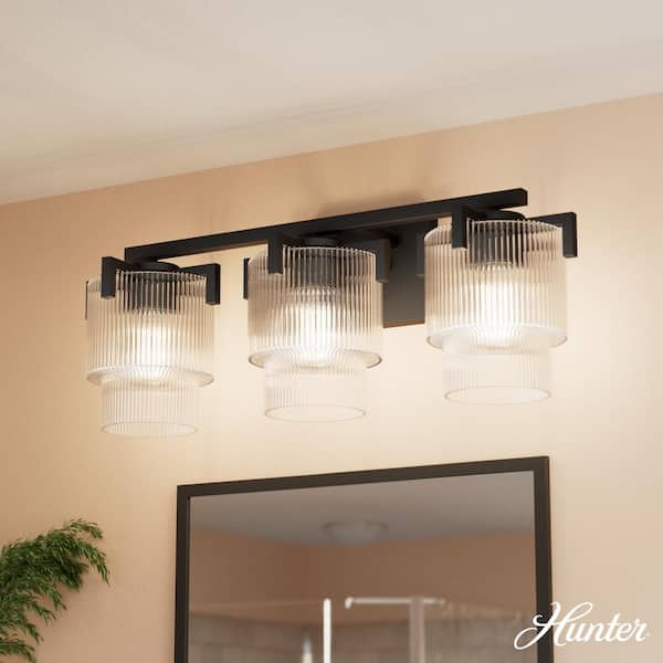 Hunter Ontario 24.25 in. 3-Light Matte Black Vanity Light with Clear Ribbed Glass Shades