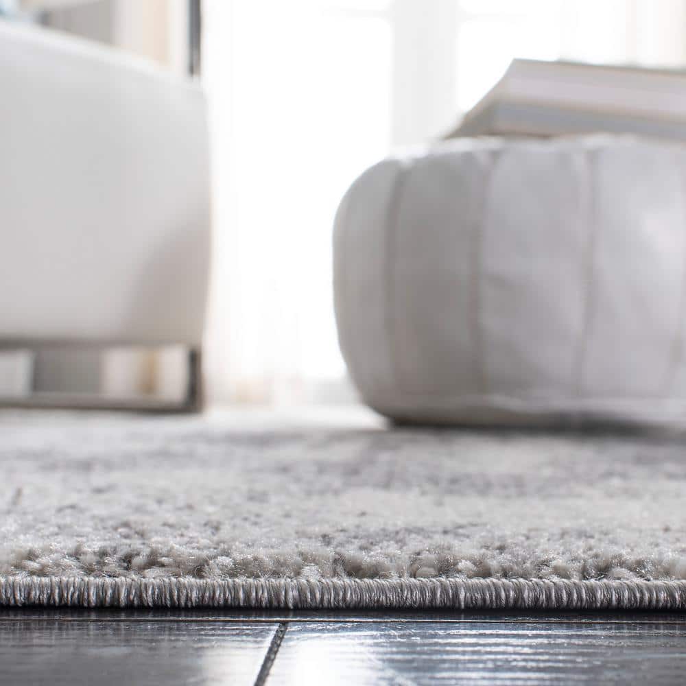 Ivory Abstract 4' x 6' Reversible Synthetic Area Rug