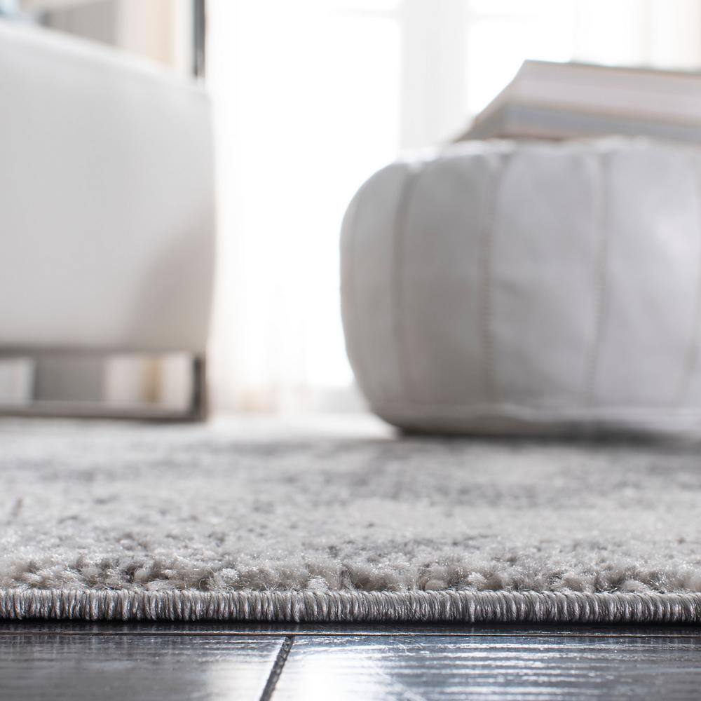 Ivory and Charcoal 8' x 10' Synthetic Area Rug