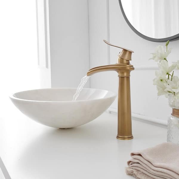 Single Handle Waterfall Vessel Sink Faucet with Drain Kit Included in Antique Brass