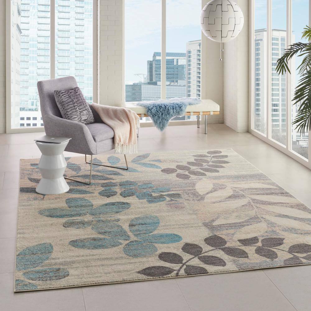 Ivory and Light Blue Floral Synthetic 8' x 10' Area Rug