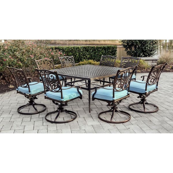 Hanover Traditions 9-Piece Outdoor Square Patio Dining Set and 8 Swivel Rockers with Blue Cushions