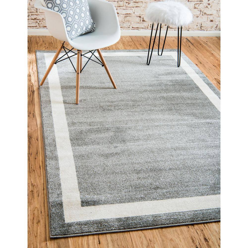 Gray and Ivory Round Tufted Synthetic Rug, 8'