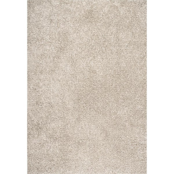 nuLOOM Kara Solid Shag Beige 5 ft. 3 in. x 7 ft. 7 in. Area Rug