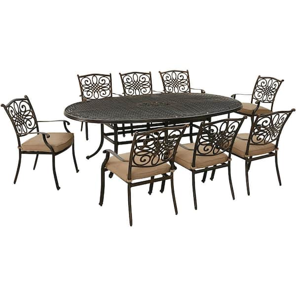 Hanover Traditions 9-Piece Aluminum Outdoor Dining Set with Tan Cushions, 8 Stationary Chairs and Oval Cast Table
