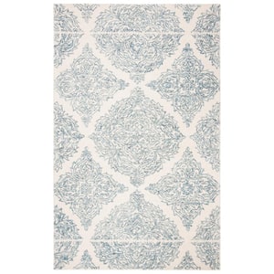Abstract Ivory/Blue 9 ft. x 12 ft. Trellis Area Rug