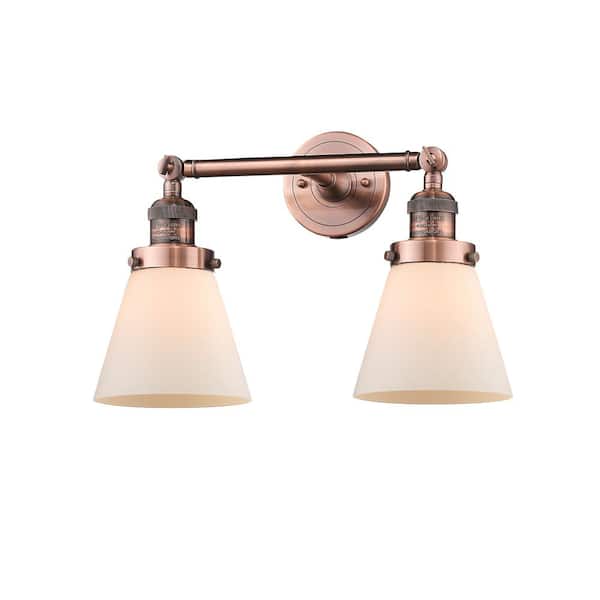 Innovations Cone 16 in. 2 Light Matte White, Antique Copper Vanity Light with White Glass Shade