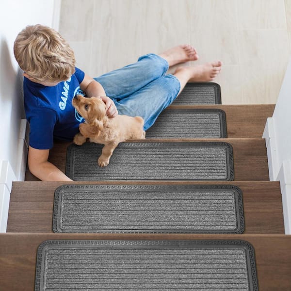 https://images.thdstatic.com/productImages/4549f4f2-4484-4f6e-9d27-0da8ef1c3a20/svn/gray-ottomanson-stair-tread-covers-otr6133-5-1f_600.jpg