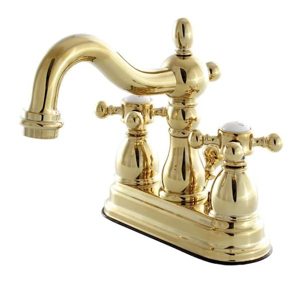 Kingston Brass Heritage 4 in. Centerset 2-Handle Bathroom Faucet with Plastic Pop-Up in Polished Brass
