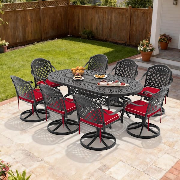 Isabella 9-Piece Cast Aluminum Patio Outdoor Dining Set with Oval Dining Table, 8 Swivel Chairs and 8 Red Cushions