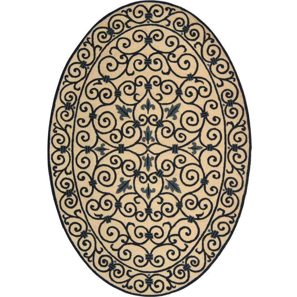 SAFAVIEH Chelsea Ivory/Dark Blue 5 ft. x 7 ft. Oval Border Area Rug 100% pure virgin wool pile, hand-hooked to a durable cotton backing. American Country and turn-of-the-century European designs. This collection is handmade in China exclusively for Safavieh. This is a great addition to your home whether in the country side or busy city. Color: Ivory/Dark Blue.