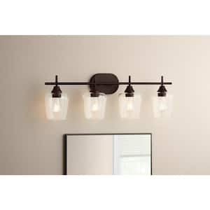 Pavlen 33 in. 4-Light Bronze Vanity Light with Clear Glass Shade