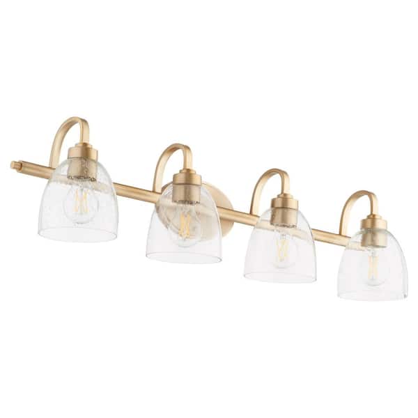 Quorum International Reyes 4-Light - 100-Watts, Medium Lamp Base Light Vanity 7 in. Width with 4-Clear Glass Diffusers - Aged Brass