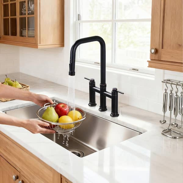 Brass Double Handle Deck Mounted Bridge Kitchen Faucet with Pull-Down Spray Head in Oil Rubbed Bronze