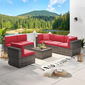 7-Piece Brown Wicker Outdoor Sectional Set with Red Cushions and Coffee Table