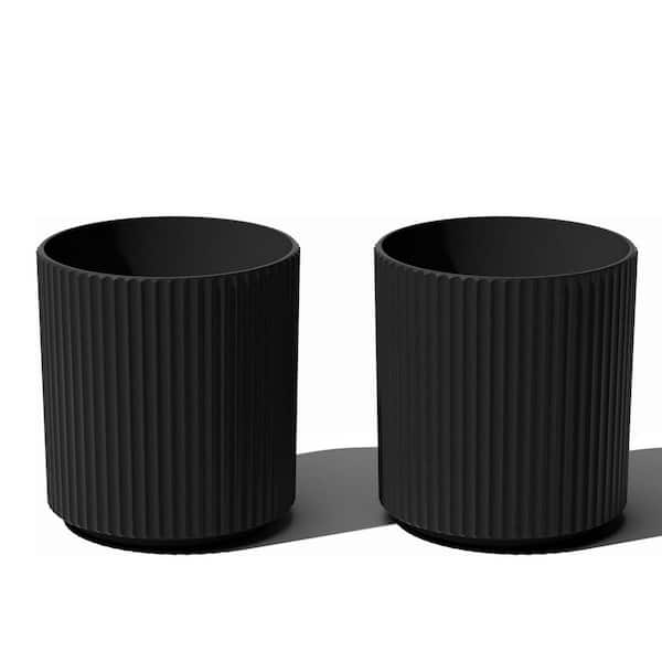 76 Qt. Large Black Plastic-stone composite Indoor/Outdoor Planter 76 Qt. Large Black Plastic-stone composite Indoor/Outdoor Planter