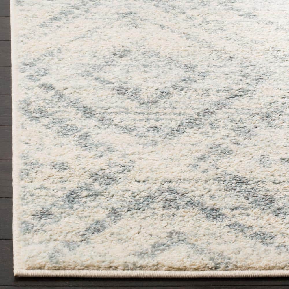 Ivory and Light Blue Geometric Rectangular Area Rug