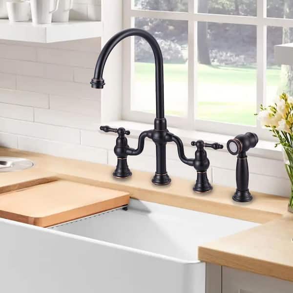Double Handle Deck Mounted Brass Bridge Kitchen Faucet with Side Sprayer in Oil Rubbed Bronze
