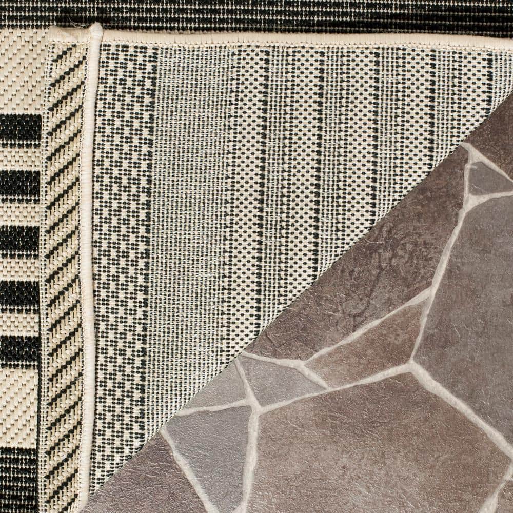Caroline 5' x 7' Black and Beige Stripe Synthetic Area Rug