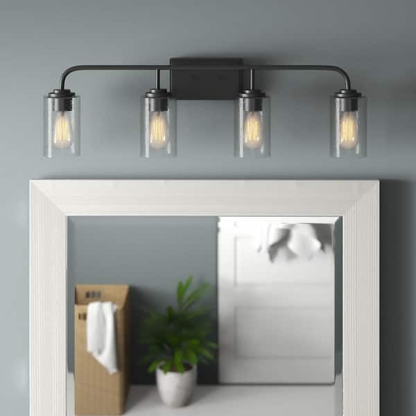 Logan 32 in. 4-Light Matte Black Transitional Wall Sconce with Clear Seedy Glass Shades