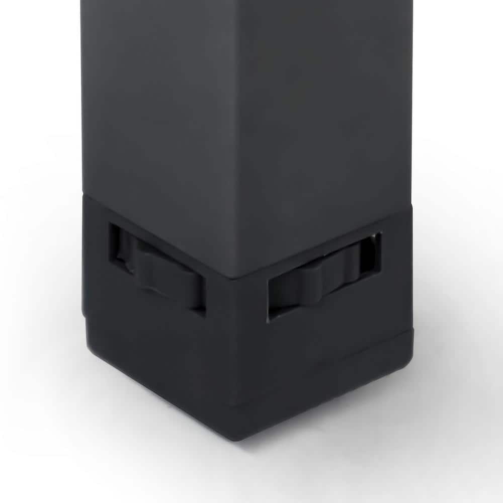 Close-up of the adjustable level control on the black metal table leg.