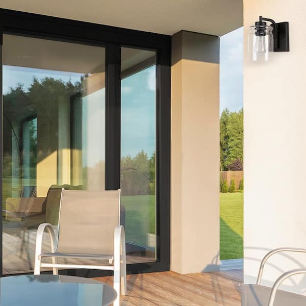 Crowe Matte Black Midcentury Outdoor 1-Light Wall Sconce with Seeded Glass Shade