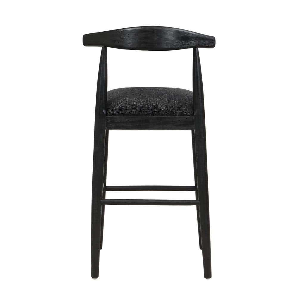 Rear view of a black fabric upholstered wood bar stool with an open back.
