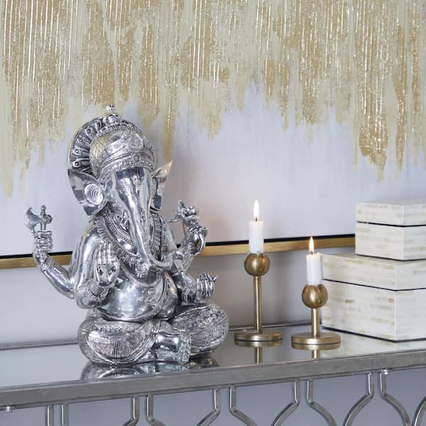 Litton Lane Silver Polystone Meditating Ganesh Sculpture with Engraved Carvings and Relief Detailing