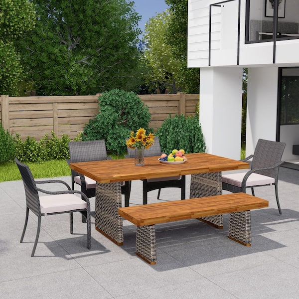 Kirk 6-Piece Solid Wood and Wicker Stackable Patio Outdoor Dining Set with Grey Cushions and Bench, Teak Finish + Grey