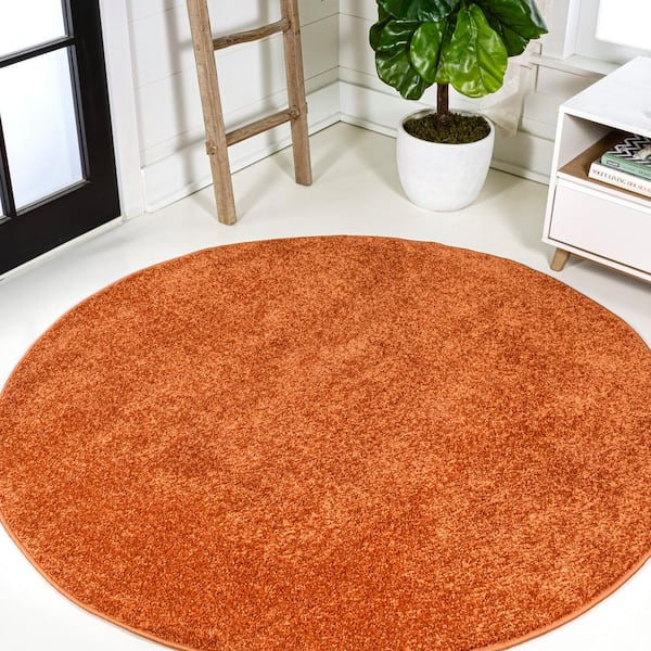 JONATHAN Y Haze Orange 4 ft. Solid Low-Pile Round Area Rug