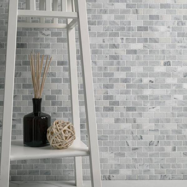 Carrara Classique Brick 11.81 in. x 11.81 in. Honed Marble Wall Tile (9.7 sq. ft./Case) Carrara Classique Brick 11.81 in. x 11.81 in. Honed Marble Wall Tile (9.7 sq. ft./Case)