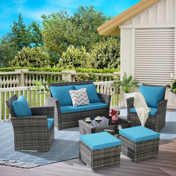 6-Piece Wicker Patio Conversation Set with Ottoman and Light Blue Cushions
