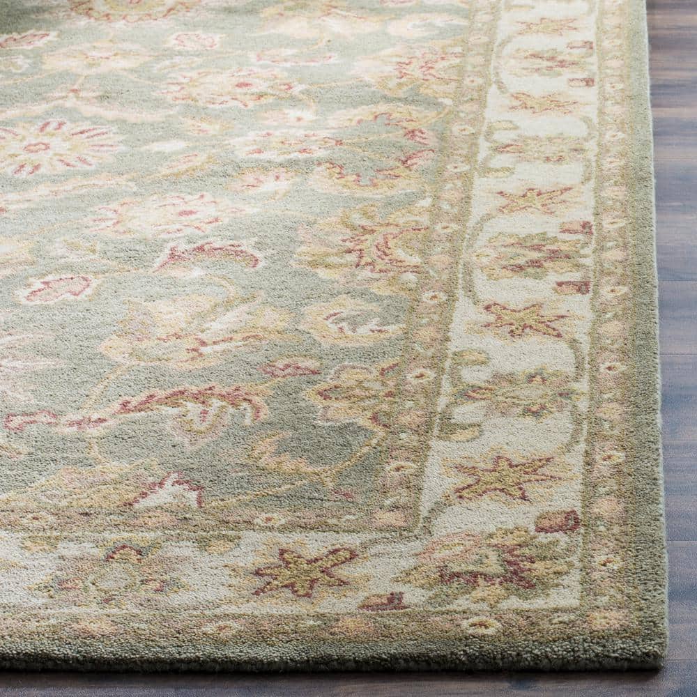 Handmade Green and Gold Wool Persian Area Rug 6' x 9'