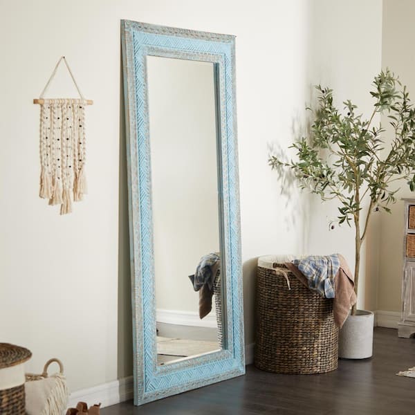 Litton Lane 72 in. x 36 in. Carved Rectangle Framed Blue Tribal Wall Mirror