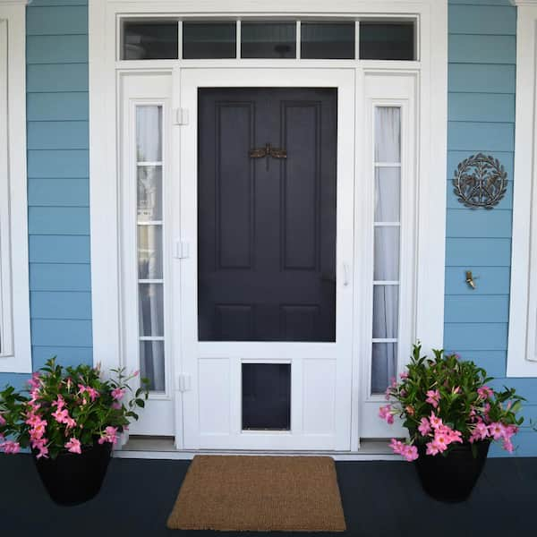 Storm door with large pet outlet door