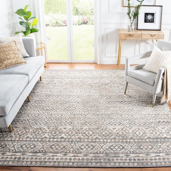 Pyramid 7 ft. x 9 ft. Ivory/Charcoal Geometric Ornate Area Rug