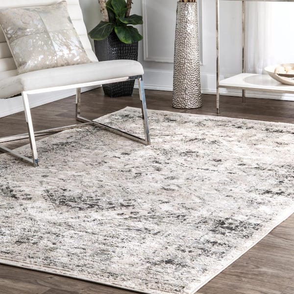 Vintage Speckled Shaunte 4 ft. x 6 ft. Silver Indoor Oval Area Rug