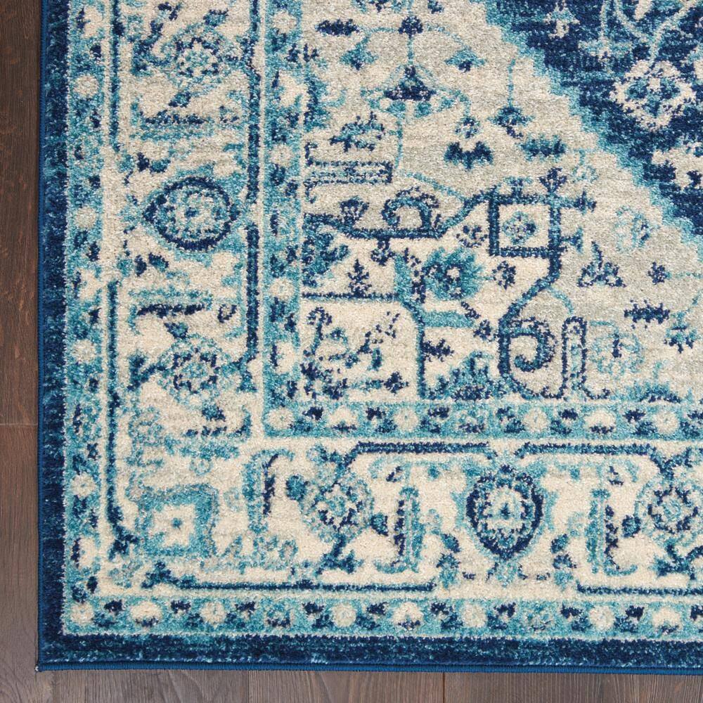 Ivory and Navy Synthetic 5' x 7' Rectangular Area Rug