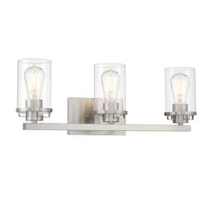 Jedrek 24 in. 3-Light Brushed Nickel Modern Industrial Vanity with Clear Glass Shades