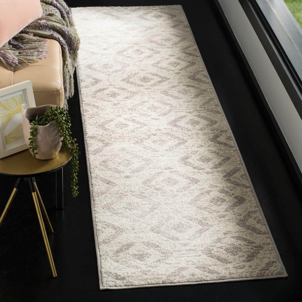 Ivory Medallion Easy-Care 2' x 6' Synthetic Runner Rug