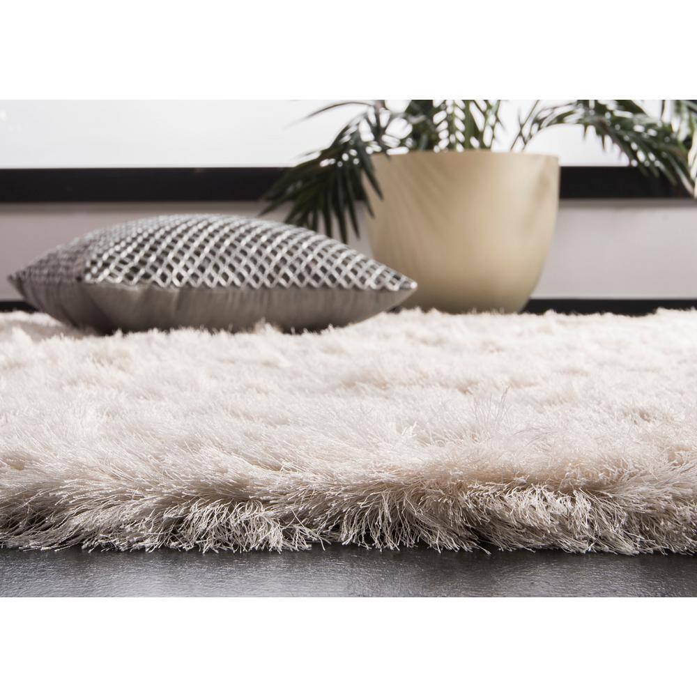 Ivory Tufted Shag 5' x 7' Wool and Synthetic Rug