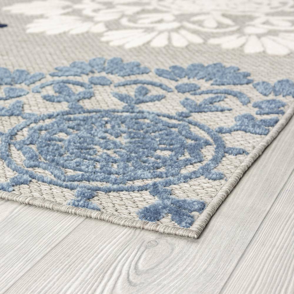 Handmade Reversible Blue Floral 5' x 7' Synthetic Rug