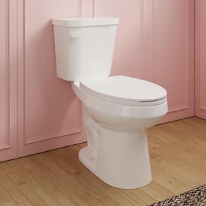 2-Piece 1.28 GPF Single Flush Elongated ADA Chair Height Toilet in White, Slow-Close Seat Included