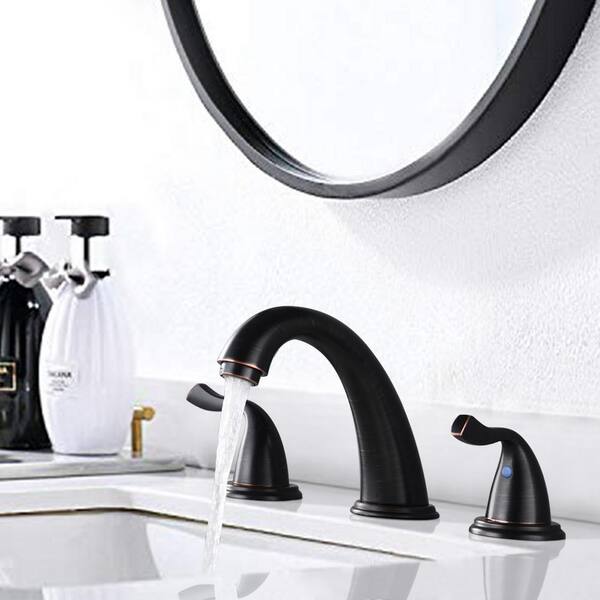 https://images.thdstatic.com/productImages/46d125d7-a6a5-455e-aff4-70f77bf10927/svn/oil-rubbed-bronze-aurora-decor-widespread-bathroom-faucets-dbfmshd2b04orb-e1_600.jpg