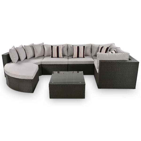 Zeus & Ruta Gray 7-piece Wicker Patio Conversation Sectional Seating Set with Striped Colorful Pillows and Light Gray Cushions