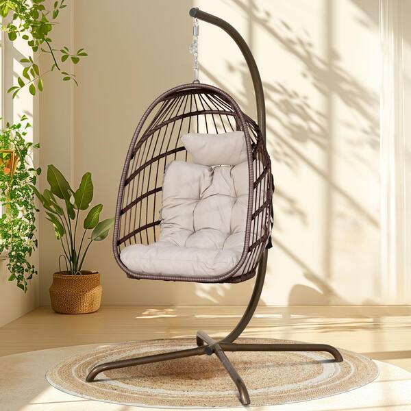 NICESOUL Foldable 350 lbs. 1 Person Brown Wicker Porch Swing Egg Chair with Gold Stand Beige Cushions HH 0035 The Home Depot