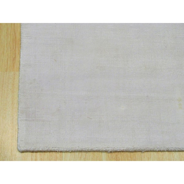 Ivory 5 ft. x 8 ft. Handmade Viscose Contemporary Random-cut Pile Area Rug