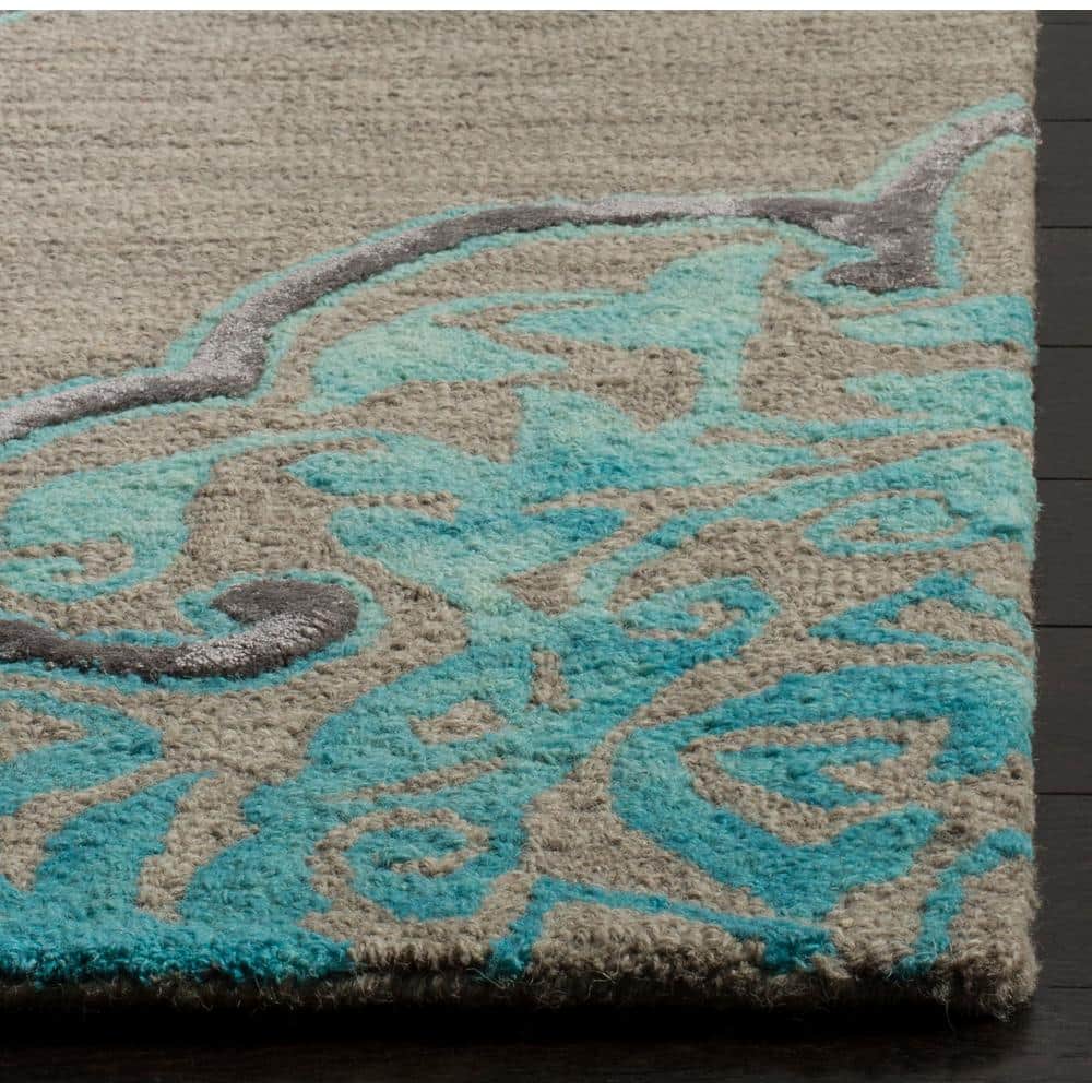 Handmade Tufted Floral Grey & Turquoise Wool-Silk Round Accent Rug