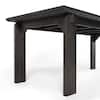 Front view of a black engineered wood dining table.