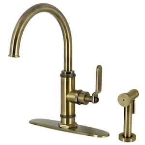 Whitaker Deck Mount Single Handle Standard Kitchen Faucet with Sprayer in Antique Brass